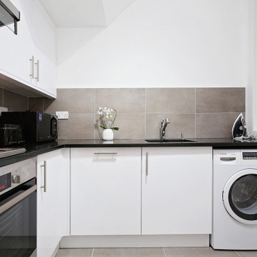 Simplicity is key in this minimalist laundry room