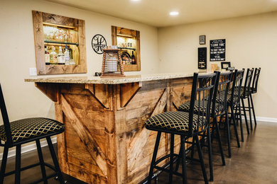 Inspiration for a rustic home bar remodel in Chicago