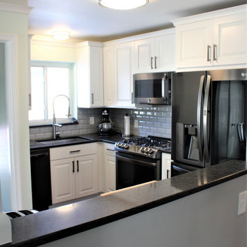 Showplace EVO Kitchen in Sierra Extra White w/ Slab Drawer Headers
