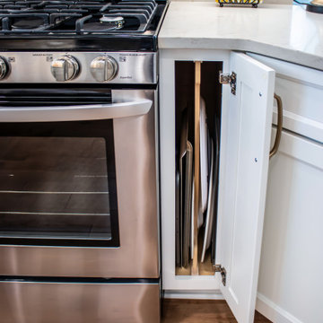 White Kitchen with Black Range Hood and Taj Royale quartz Countertops