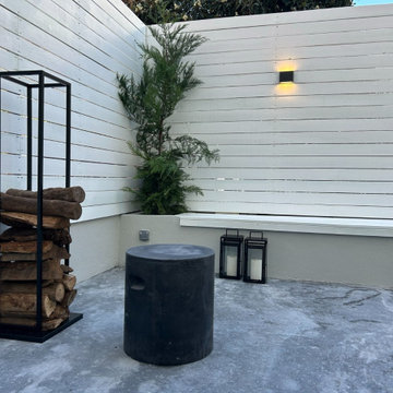 Terrace Log Storage, Fire Bowl and White Clad Walls