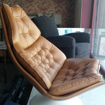 Fauteuil pied tulipe recouvert en cuir