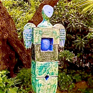 Un ange dans un jardin exotique...