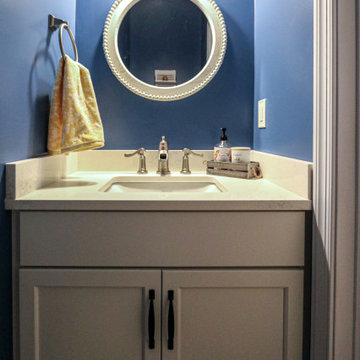 Blue Powder Room with White Vanity and Carrara Quartz Countertop