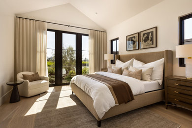 Example of a country bedroom design in Orange County