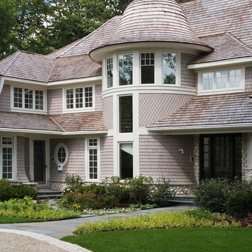 Cape Cod Stone and Shingle Style House with Turret Front Staircase