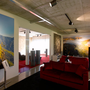 Home theater - small contemporary enclosed concrete floor and gray floor home theater idea in Munich with white walls and a projector screen