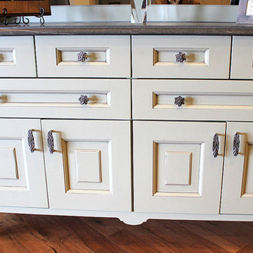 Opulent Scroll Knobs and Pulls Antique Brass