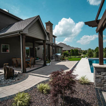 Versatile Outdoor Escape: Turf, Patio, Pergolas & Water Features