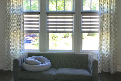 Example of a transitional bedroom design in New York