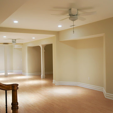 Basement Hall With Crown Moulding and Baseboard Profiles