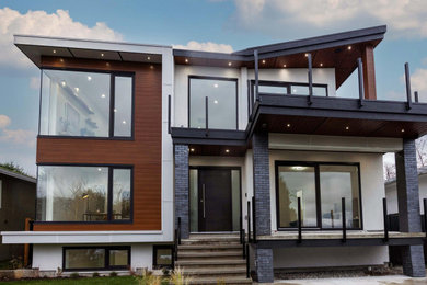 Home design - large contemporary home design idea in Vancouver