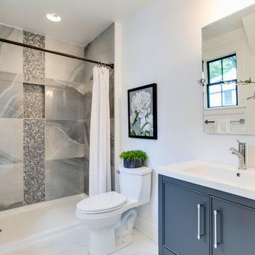 Modern Guest Bathroom with Bold Porcelain Tile and Charcoal Vanity