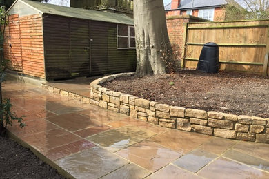 Oxford paving with purbech walling