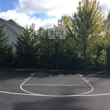Daniel R's Pro Dunk Gold Basketball System on a 50x45 in Bedford, NH