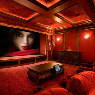 Design ideas for a classic enclosed home cinema in Los Angeles with red walls, carpet and red floors.