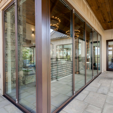 A Waterfront Retreat with 280-Degree Views via Open Corner Glass NanaWall Doors