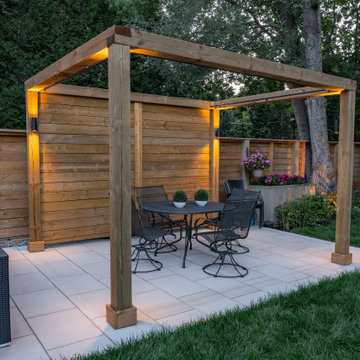 Modern Cedar Pergola, Porcelain Patio & Outdoor Lighting Backyard Renovation
