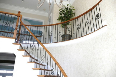 Design ideas for a beach style staircase in Charlotte.