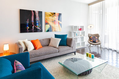 Inspiration for a mid-sized modern open concept linoleum floor and brown floor living room remodel in Miami with white walls, no fireplace and no tv