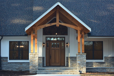 Example of a mountain style home design design in Raleigh