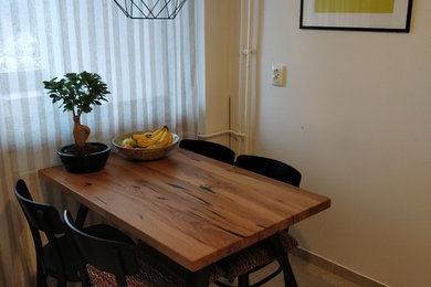 This is an example of a scandinavian dining room in Surrey.