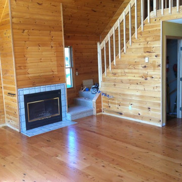 Reclaimed Douglas Fir Flooring in a Bright Wood Paneled Living Room
