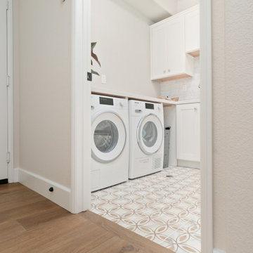 White laundry room, fun floor tile