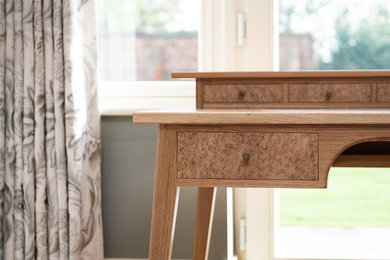 Inspiration for a traditional home office in Hertfordshire with a freestanding desk.