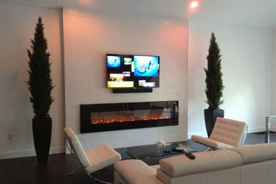 This is an example of a contemporary family room in Phoenix.