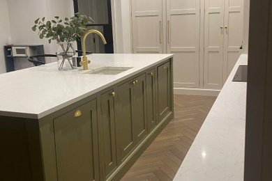 Pale green hand-painted kitchen