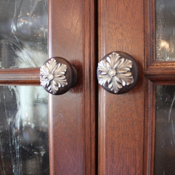 Beautiful Kitchen Featuring the Opulent Scroll Pulls & Opulent Flower Wood Knobs