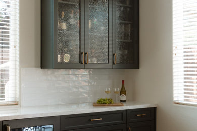 Example of a transitional home bar design in Sacramento