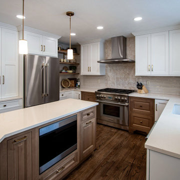 Two Tone Kitchen with Floating Shelves and Island Seating and Updated Fireplace
