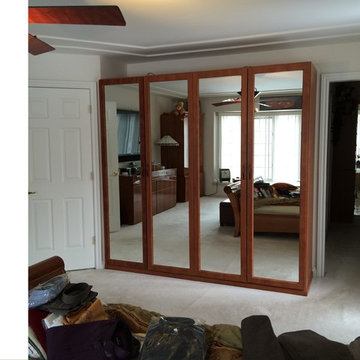 Built-out Wardrobe Closet with Mirrored Doors