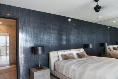 Bedroom - mid-sized modern master vinyl floor bedroom idea in Atlanta with black walls