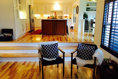 Example of a transitional home design design in Denver