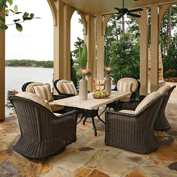 Euro height outdoor wicker chairs and stone patio table