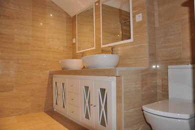 Transitional bathroom in Madrid.