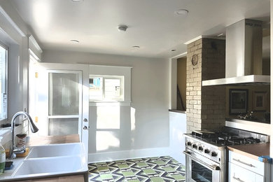 Example of a trendy kitchen design in Calgary