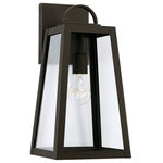 Capital Lighting - Capital Lighting Leighton 1 Light 100W Outdoor Wall Lantern, Bronze - The subtle contrast of the clean arch on top of the pronounced frame and sleek modern lines in the Leighton Collection bring a refreshing take on lantern-style outdoor fixtures. These fixtures are part of our Rain or Shine Collection and are backed by our five-year warranty. The wall lanterns are also available in a minimal light emissions design.