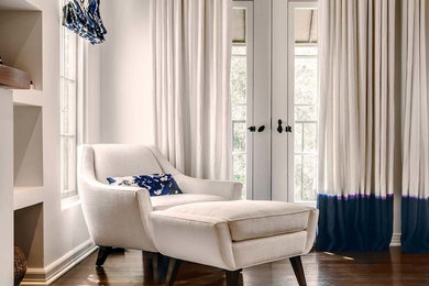 Inspiration for a large eclectic master dark wood floor bedroom remodel in San Francisco with white walls