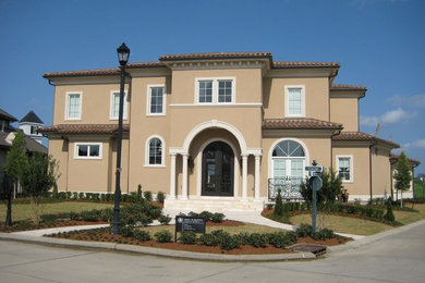Inspiration for a mediterranean exterior home remodel in New Orleans