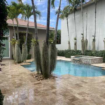 Luxury Travertine Pool Deck Renovation in the Treasure Coast, FL