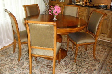 Dining room - small traditional light wood floor and beige floor dining room idea in Other with no fireplace and beige walls