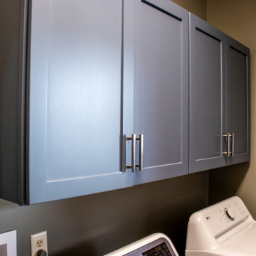 Updated Laundry Room with Stormy Medium-Blue Cabinets