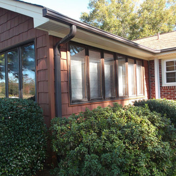 After: Sunroom with Updated Siding and Soffit