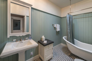 Inspiration for a mid-sized farmhouse master marble floor and gray floor bathroom remodel in Other with green walls and a pedestal sink