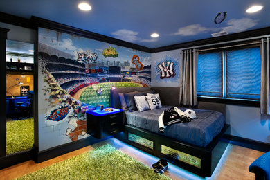 Photo of a contemporary kids' room for boys in Los Angeles with multi-coloured walls.
