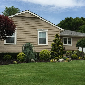 Seaford Siding - Tuscan Clay Shakes with Plum Creek Ledgestone